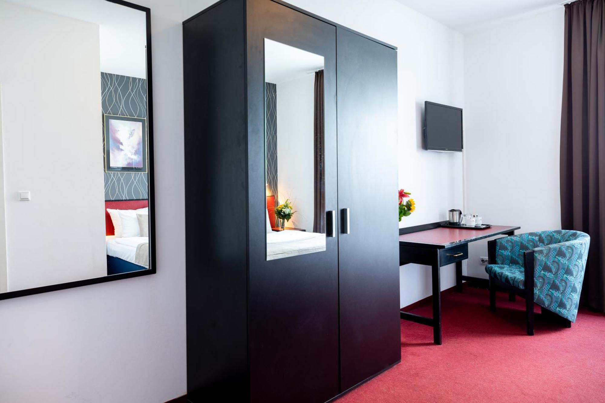 Hotel Aviva Лайпциг Стая снимка